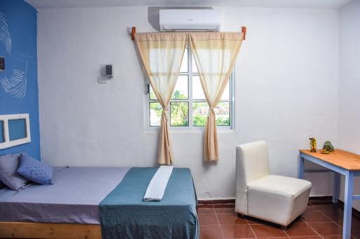 Departamentos Cerca De Ferry Holbox Hotel Exterior photo
